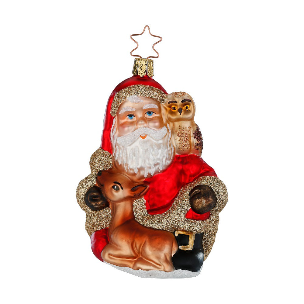 A decorative glass Christmas ornament featuring Santa Claus with a red scarf, holding a brown owl and a deer, against a white background.