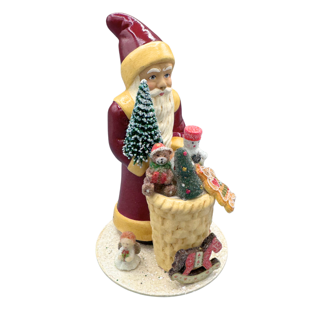 Santa Papier Mache Figure with basket of toys, old red by Ino Schaller