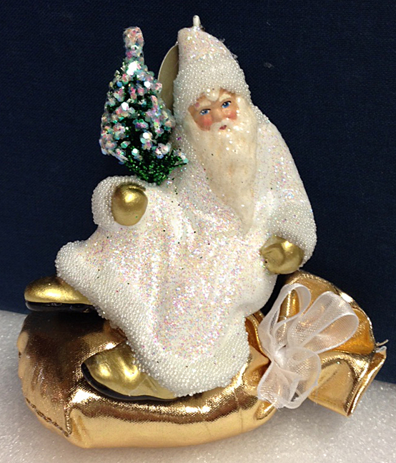 Santa with Tree on gold sack, Papier Mache Ornament, white beaded and glittered by Ino Schaller