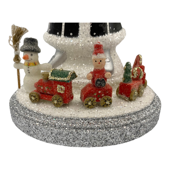 Santa in Cloak, Papier Mache Figure, black with white trim by Ino Schaller