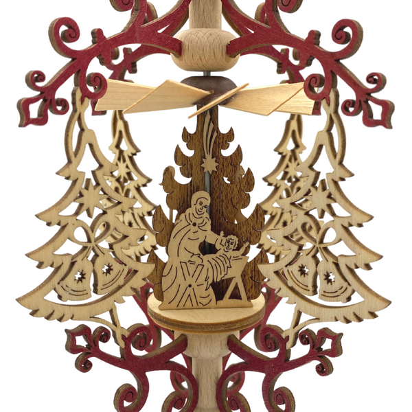 Scroll and Tree Frame with Nativity, Hanging Pyramid by Harald Kreissl