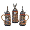 Three decorative beer steins with intricate designs and eagle embellishments on a white background.