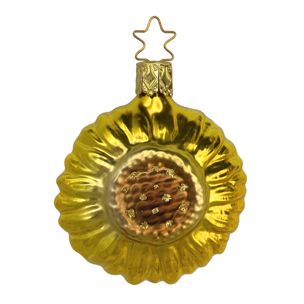 A yellow glass sunflower ornament with a brown center and gold accents, designed for seasonal decoration.