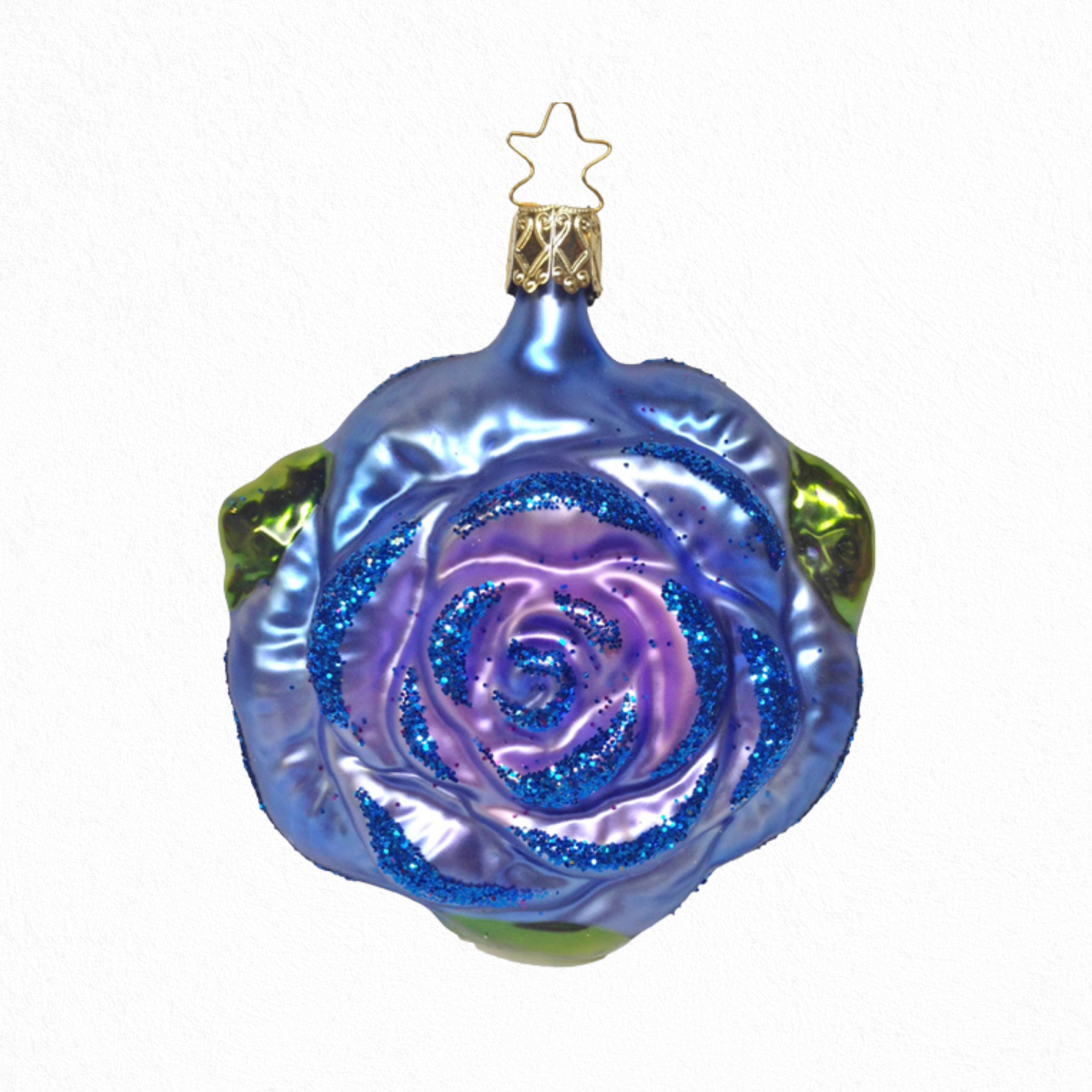 Decorative glass ornament shaped like a rose with a blue and purple gradient on a white background.
