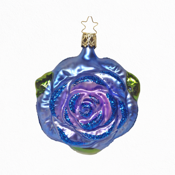 Decorative glass ornament shaped like a rose with a blue and purple gradient on a white background.