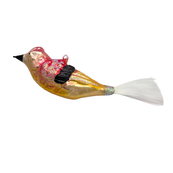 Decorative bird ornament in gold, red and black with a glass loop on its back for hanging.