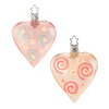 Two heart-shaped ornaments with spiral patterns on a white background 