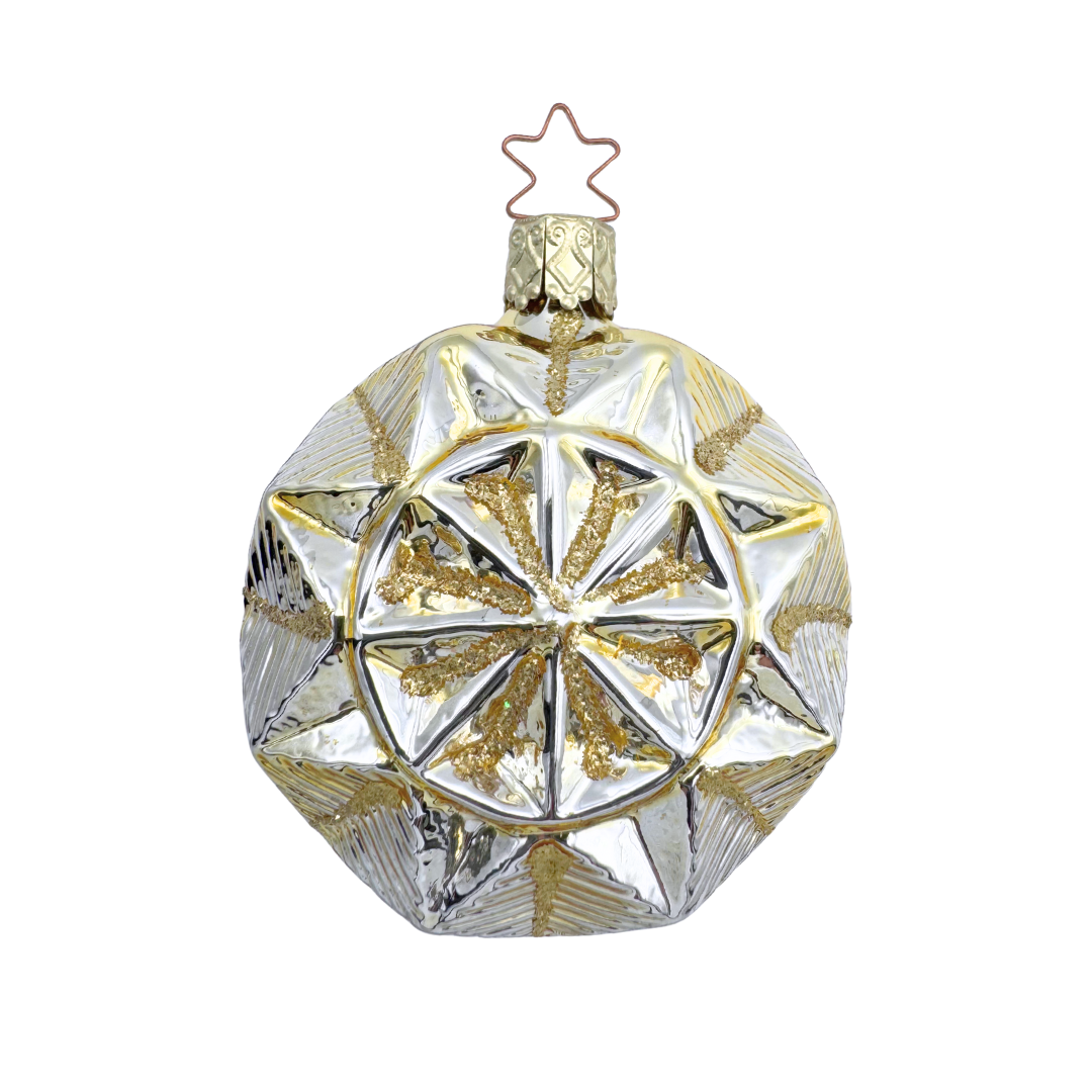 Geometric faceted gold Christmas ornament with a gold star top for hanging by Inge Glas of Germany on a white background