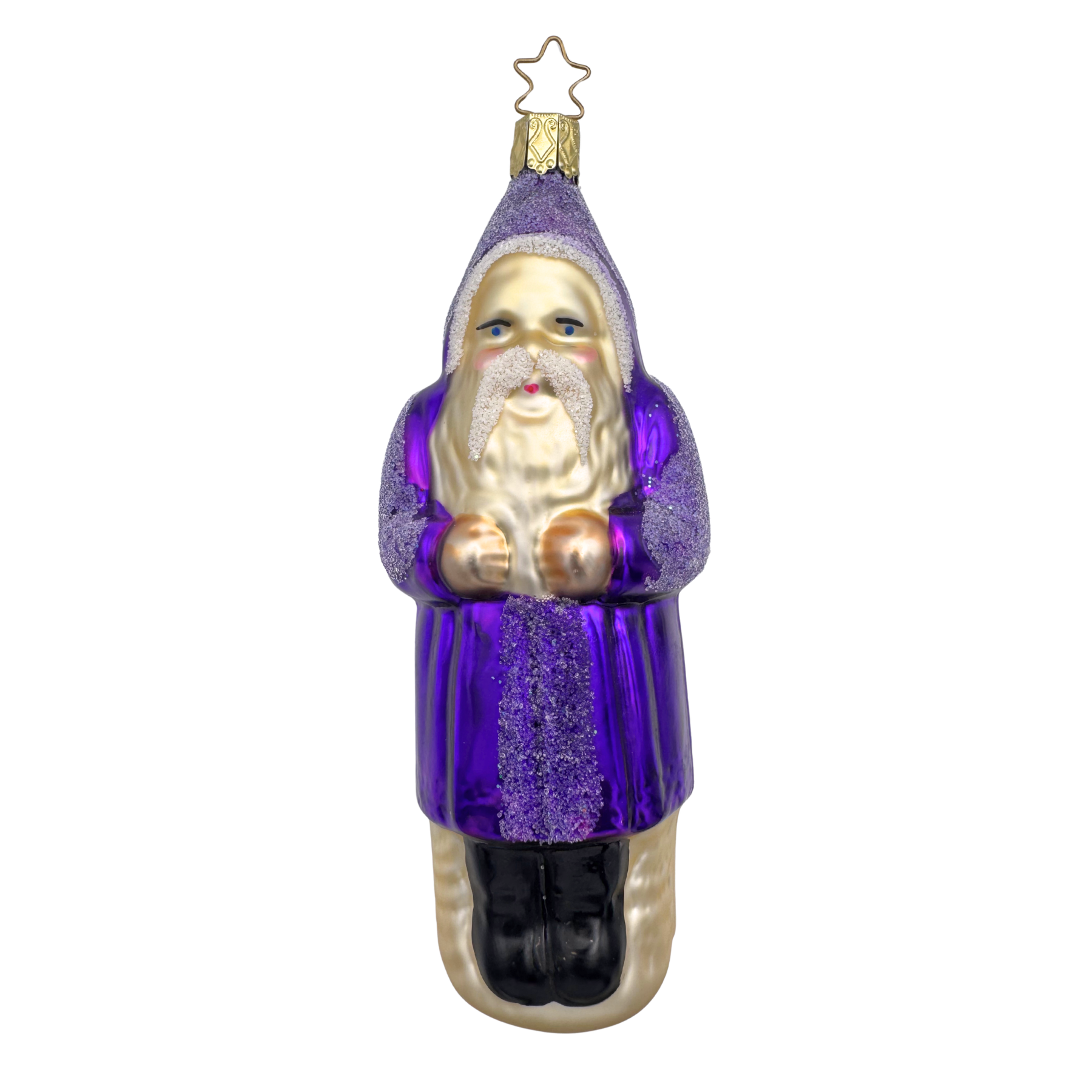 A purple glass Belsnickel ornament with a happy facial expression, wearing a purple hat and coat, standing with a gold star top for hanging by Inge Glas of Germany.