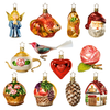 A collection of various hand-painted, mouth blown glass ornaments for Christmas trees, including figurines of an angel, fish, rabbit with a carrot, Santa Claus, tea pot, bird, red heart, pink rose, flower basket, fruit basket, pine cone and house, all with either a star-shaped topper or affixed to a clip for hanging.