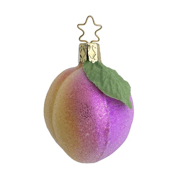 Decorative ornament shaped like a purple and gold Sugar Plum with a green leaf by Inge Glas of Germany