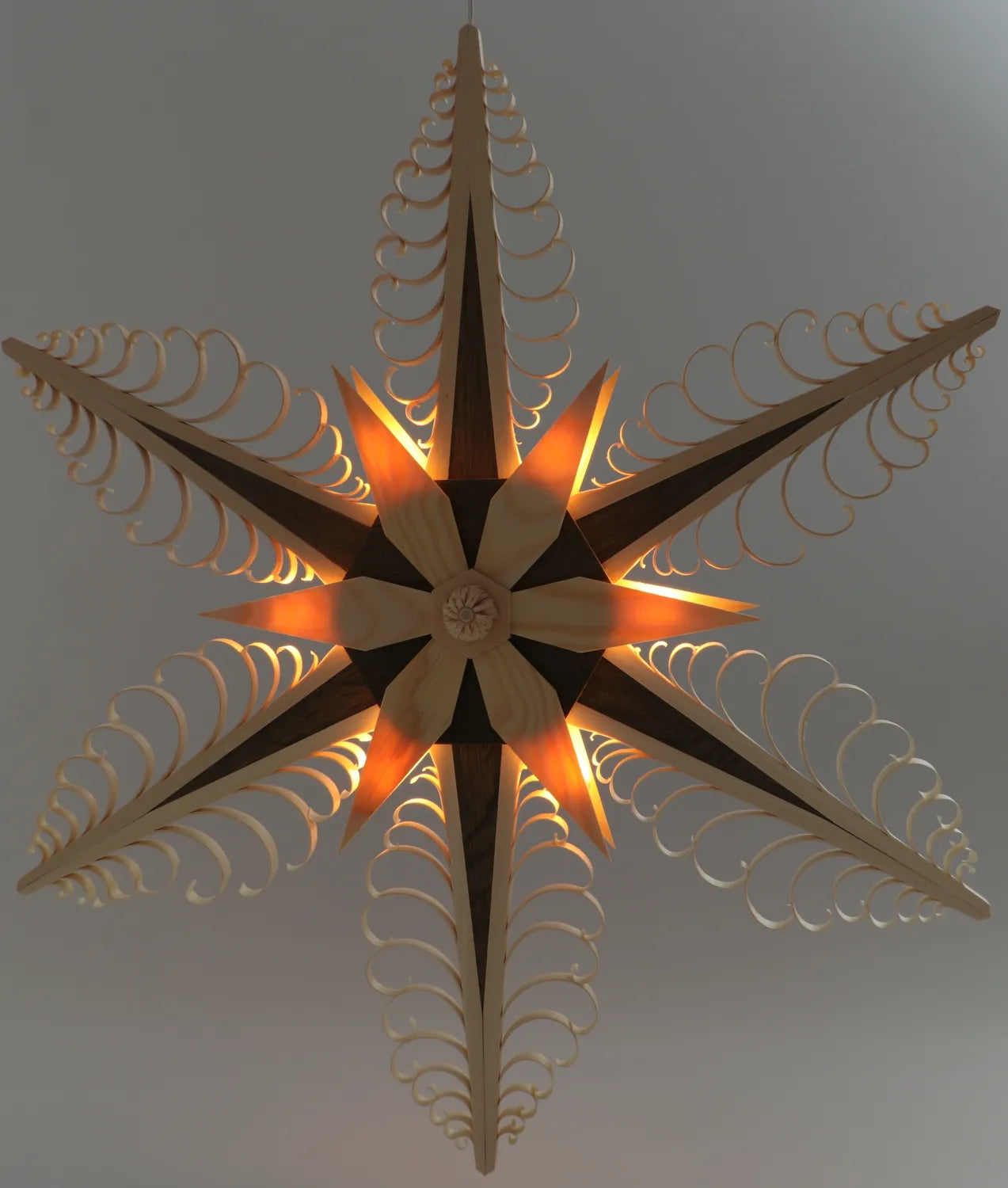 Illuminated Hanging Star, 52cm, with 6 flat curl trees, natural and walnut by Martina Rudolph