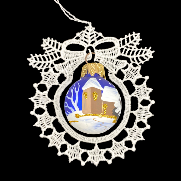 Decorative ornament with a snowflake lace design on a black background