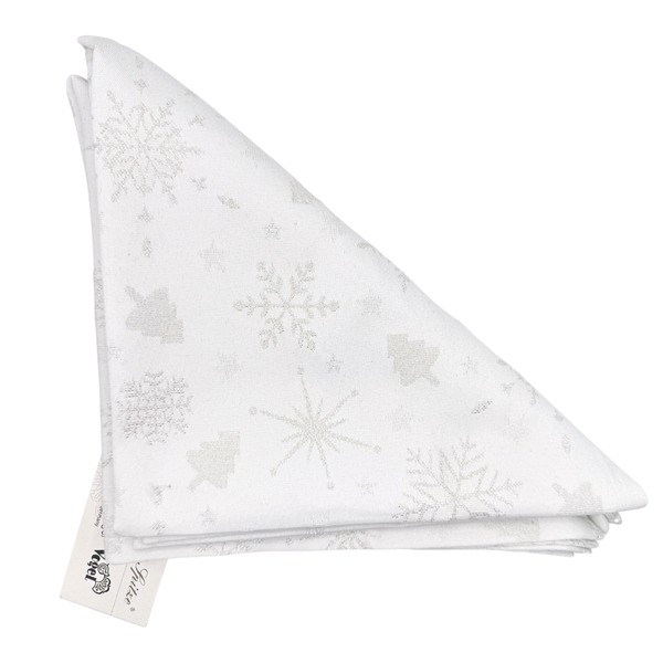 Folded white napkins, in a triangular shape with silver snowflake and trees pattern on a white background