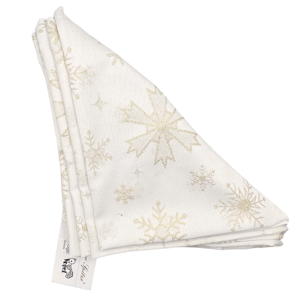 Folded white napkins, in a triangular shape with gold snowflakes pattern on a white background