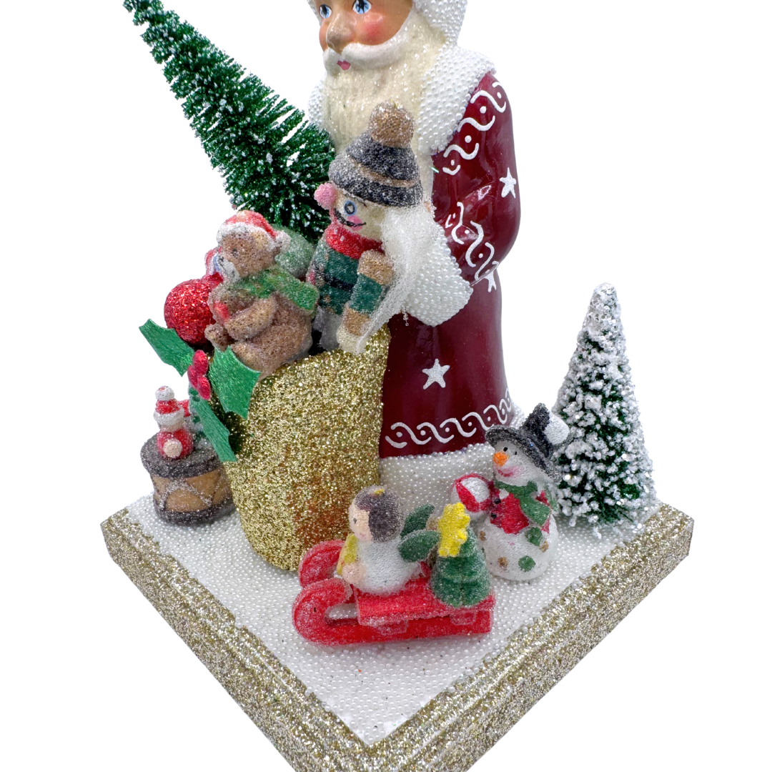 Santa Papier Mache Figure on base with basket of toys by Ino Schaller