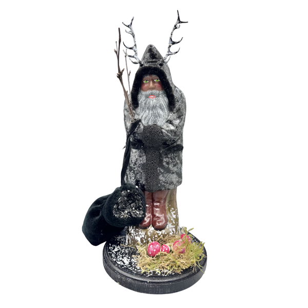 Krampus papier mache figure with coal bag on base by Ino Schaller