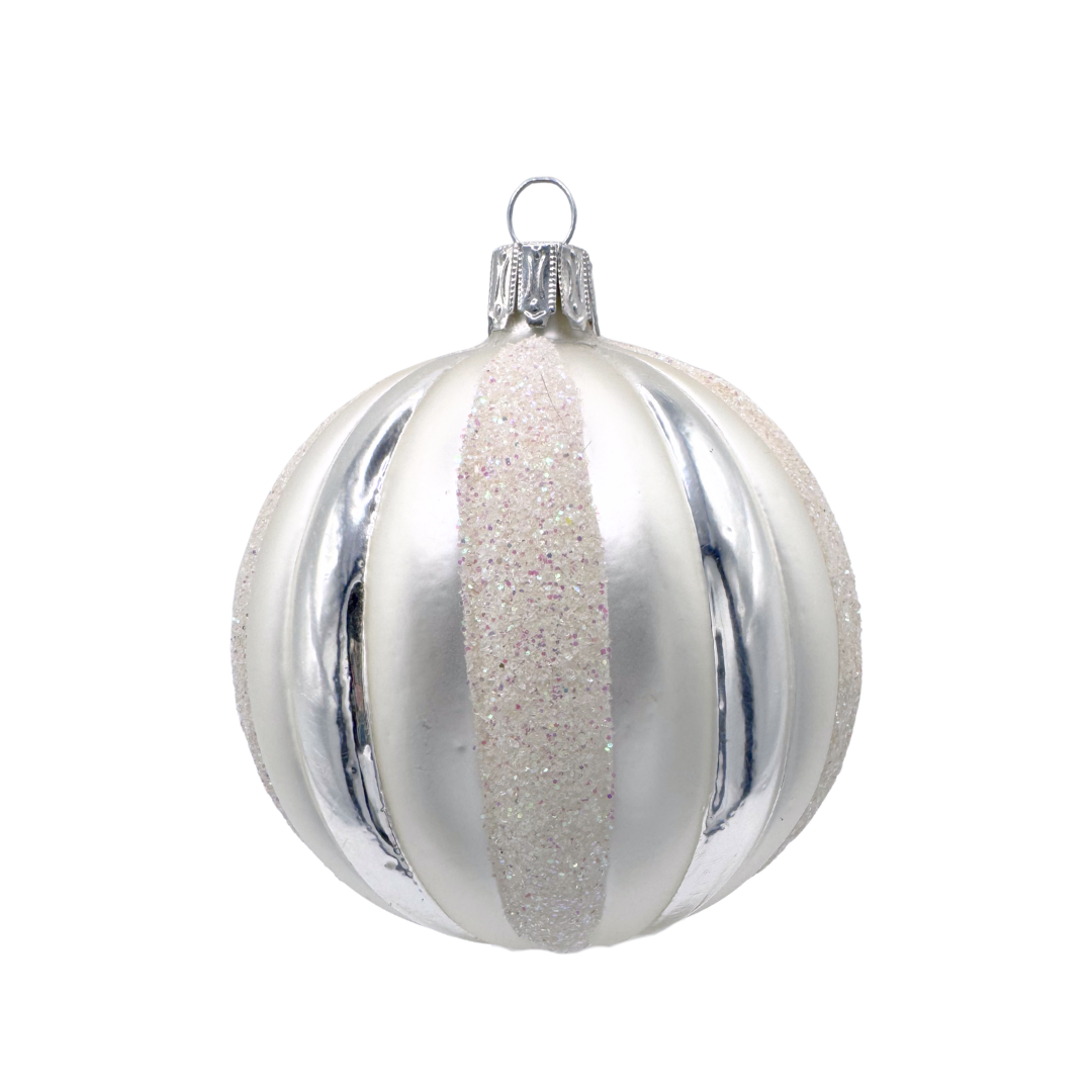 Silver and white Christmas ornament with a glittery vertical bands on a white background