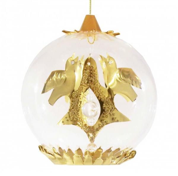 A clear glass hanging ornament with a gold-toned central decorative piece featuring two birds and a pearl-like accent, shown against a plain white background.