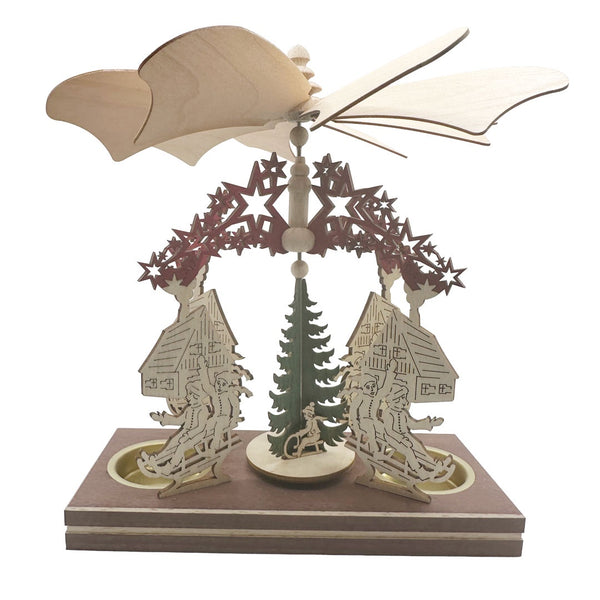 Star and Sledding Frame with Children, Double Tea Light Pyramid by Harald Kreissl