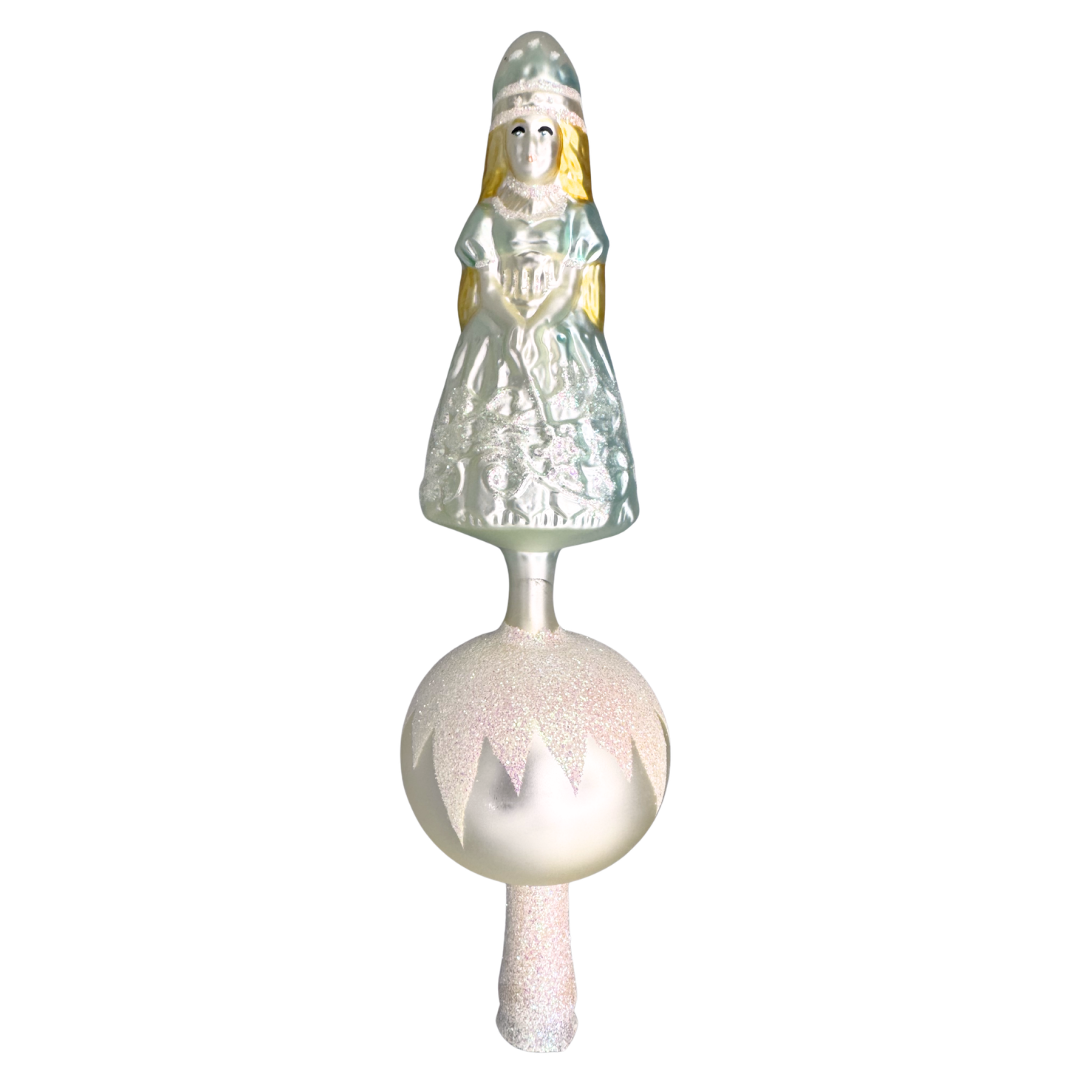 Decorative tree topper with a blown glass figure of a princess in soft shades of pink and blue