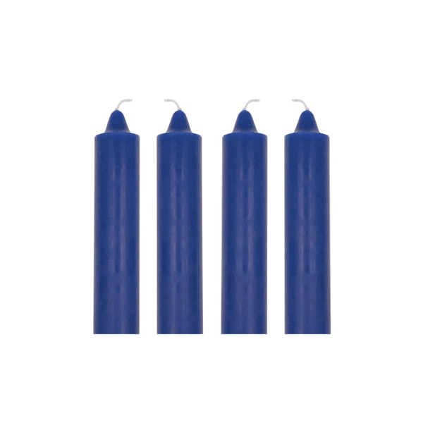Four blue candles on a white background