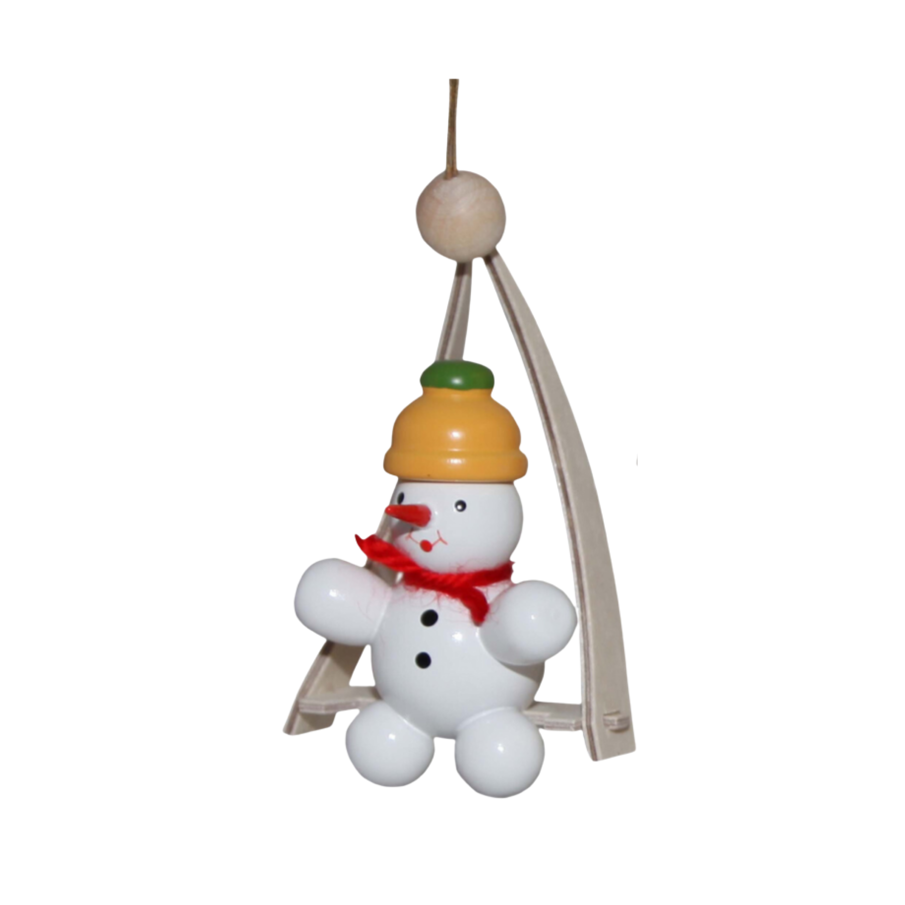 Decorative snowman on a swing ornament with a yellow hat and red yarn scarf on a white background