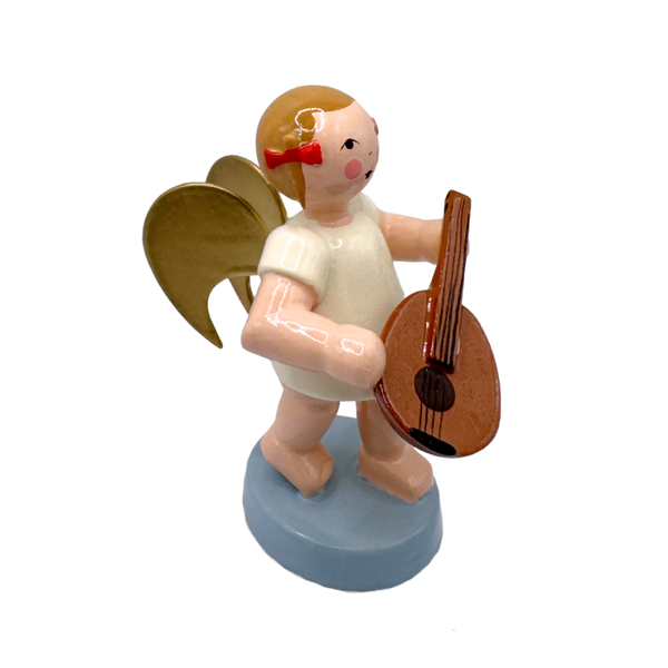 Miniature figure of an angel with gold wings playing a lute on a blue base