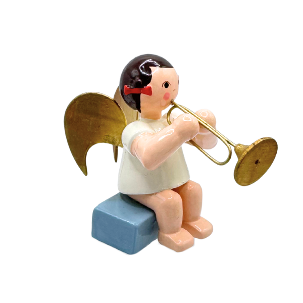 Angel with Trumpet, brunette, sitting by Ulmik