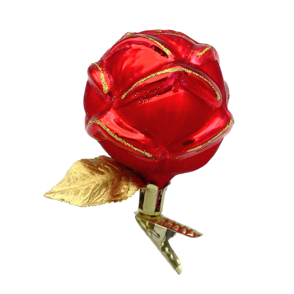 A clip-on glass ornament shaped like a red rose with gold accents and a gold leaf.