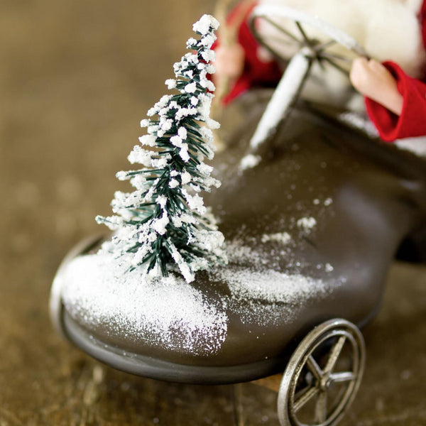 Santa Claus Sitting in Shoe with Wheels Figurine by Marolin Manufaktur