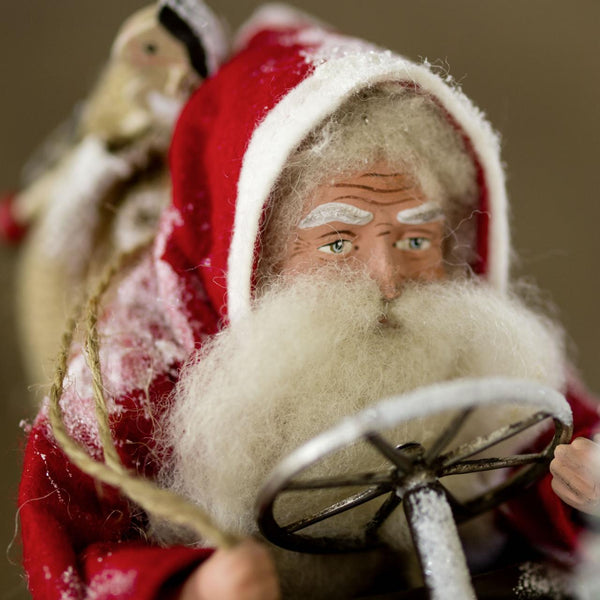 Santa Claus Sitting in Shoe with Wheels Figurine by Marolin Manufaktur