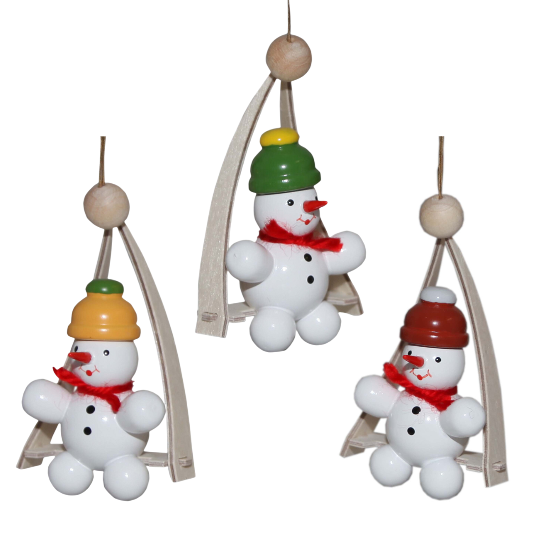 Snowman on Swing Ornament by Volker Zenker