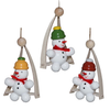 Handcrafted wooden swing ornaments in the shape of snowmen, with different colorful details on a white background.